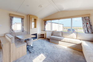 New Europa Caernarfon 28ft x 12ft - 2 bed static caravan for sale at Castel Cove Caravan Park, Abergele North Wales - Lounge View