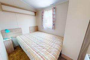 Preowned 2016 Willerby Mistral 35ft x 12ft - 2 Bedroom Static Caravan - Castle Cove Caravan Park - twin bedroom