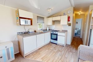Preowned 2016 Willerby Mistral 35ft x 12ft - 2 Bedroom Static Caravan - Castle Cove Caravan Park - kitchen